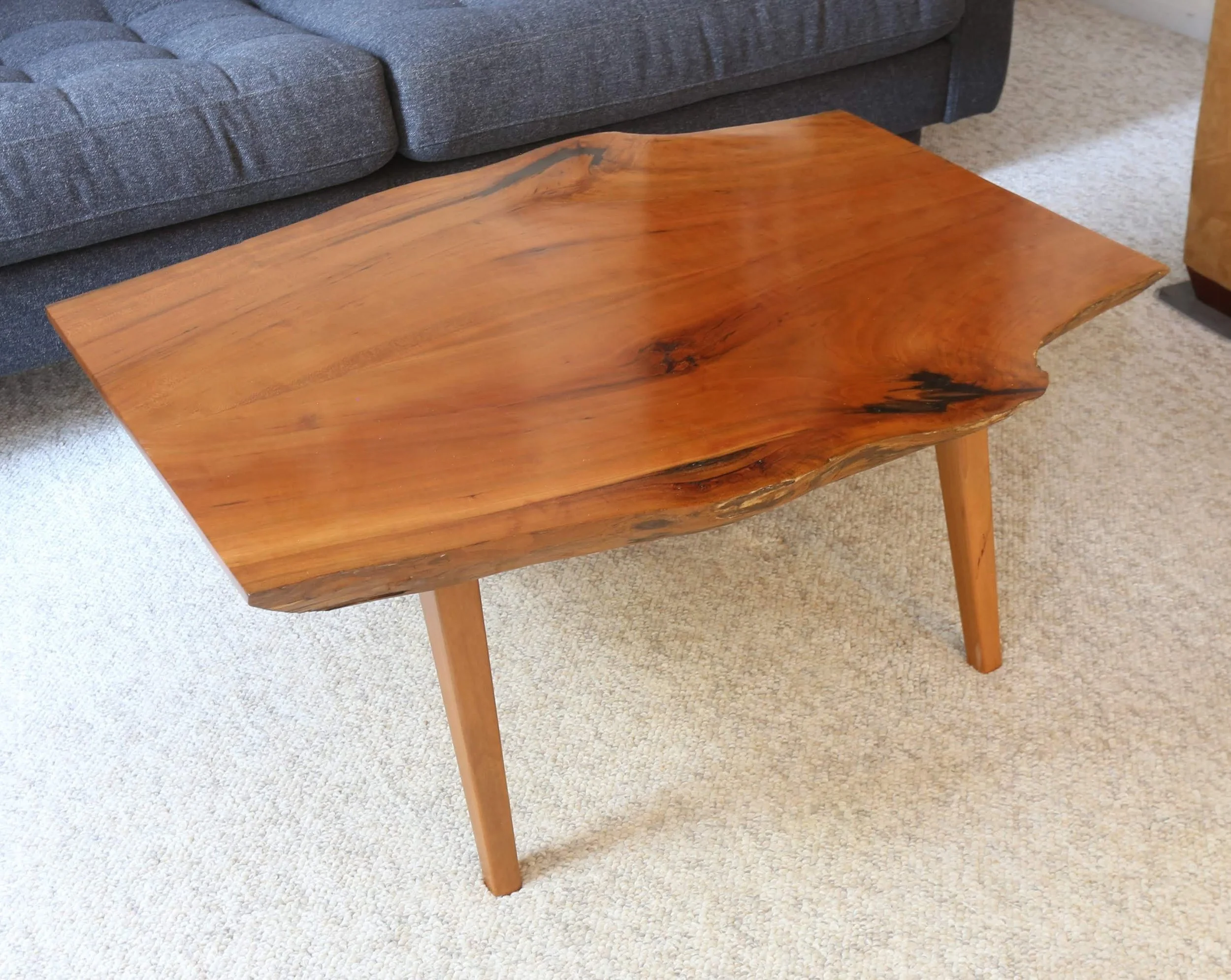  Bookmatched cherry coffee table. 