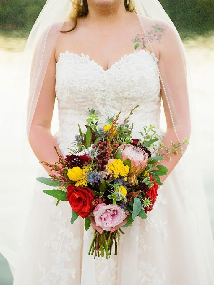 Beautiful and bold, Lainey and Wyatt&rsquo;s florals made a statement from the moment guests arrived. Every bloom was thoughtfully designed to complement their vision, adding beauty, personality, and elegance to every part of their day. We love creat