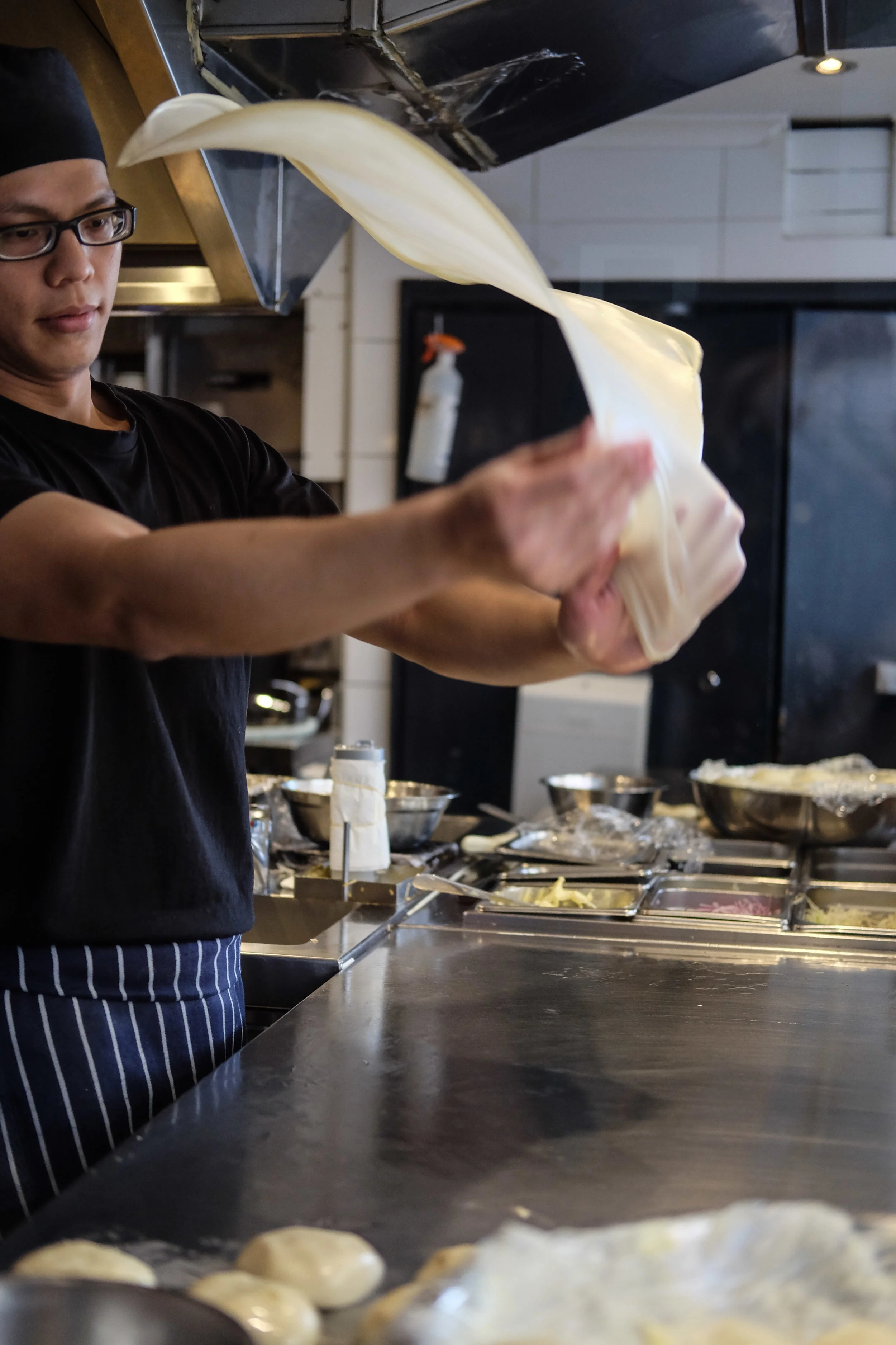 Mamak (9 min walk) Good, authentic Malaysian food outside of Malaysia can be hard to find, and this place meets all three criteria. The first clue greets you as you arrive - long queues; a double-edged sword suggesting something good awaits, with the emphasis on the wait. Big glass windows allow you to watch homemade Roti Chanai, that celebrated Malaysian comfort dish, being freshly made; another rarity. Order the Kari Ikan (fish curry) if you like it hot, the Ayam Goreng (fried chicken pieces) if you like it crispy and the Chicken Satay if you like it tender on a stick. Extra points if you order a cup of hot, bubbly Teh Tahrik (Malaysian “pulled tea”), another fine Malaysian speciality.