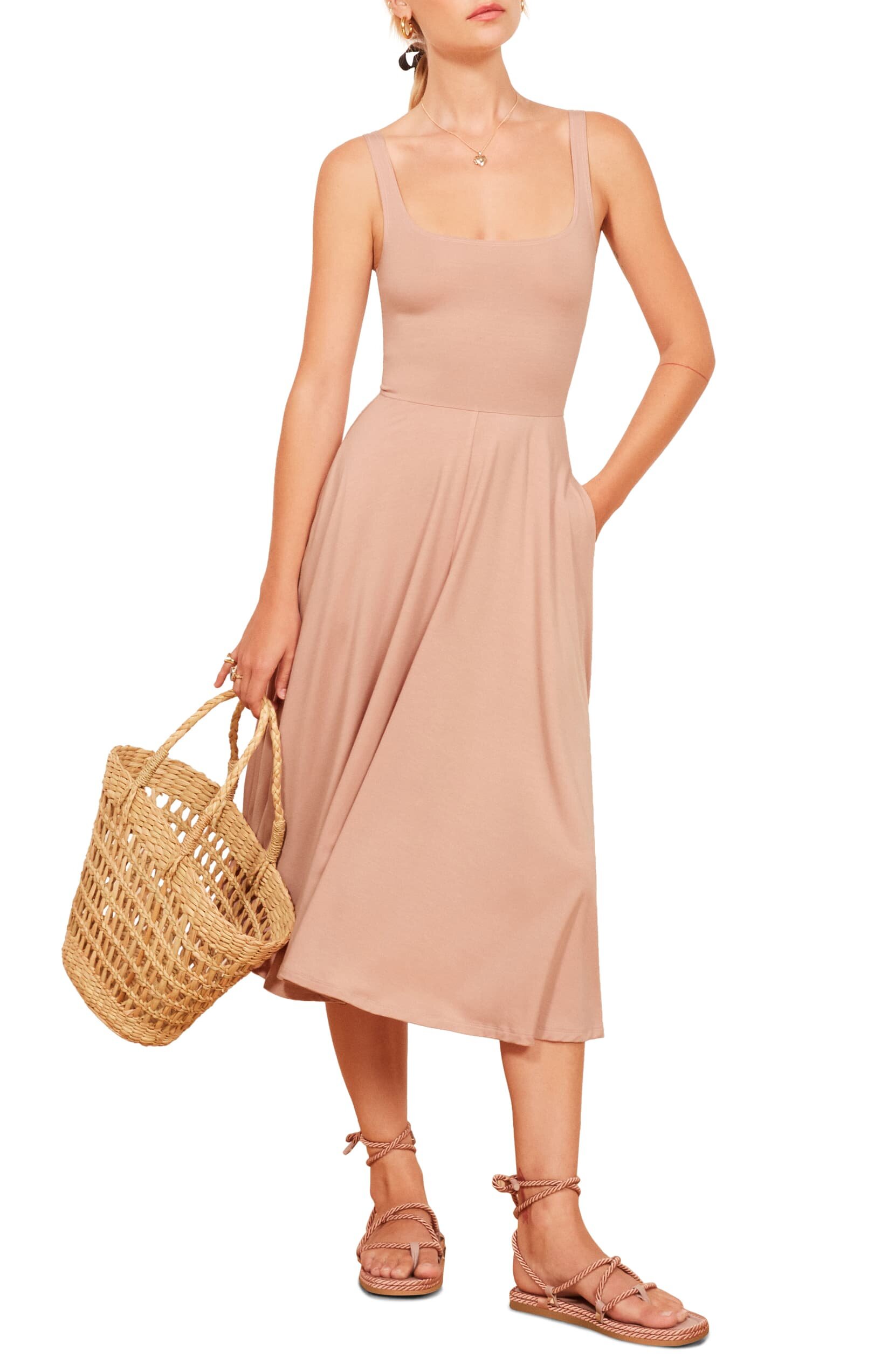 Available in black or blush, this universally flattering dress is also eco friendly. Bam!