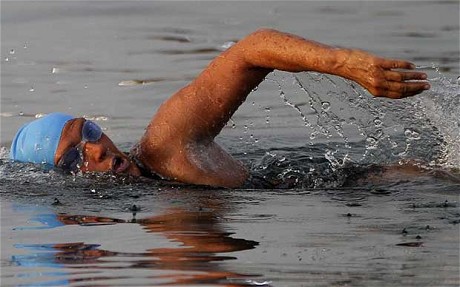  In 2013 aged 63, Diana Nyad became the first person to swim from Cuba to Florida without a shark cage. It was her fifth attempt having to quit previous tries because of hypothermia, weather, sharks and being attacked by a swarm of jellyfish. 