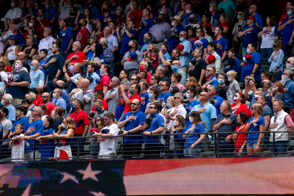  Fans fill the stands at Globe Life Field during the first inning of a baseball game between the Texas Rangers and the Toronto Blue Jays, Monday, April 5, 2021, in Arlington, Texas. 