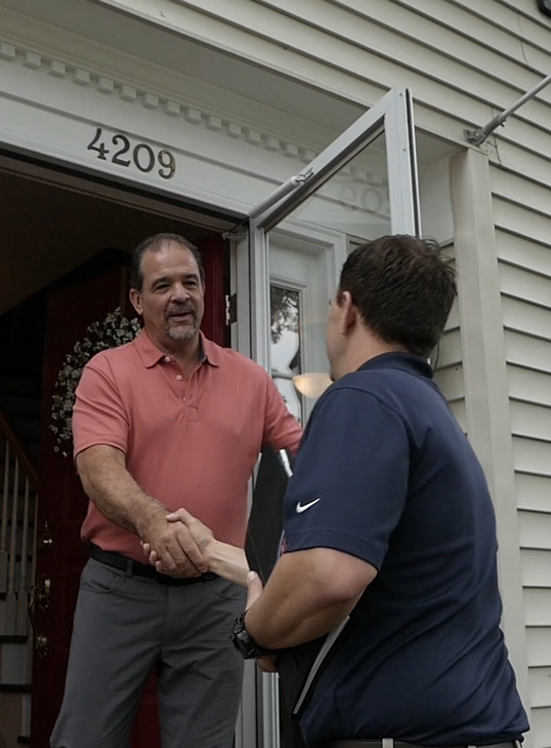 hi res greeting at door.png