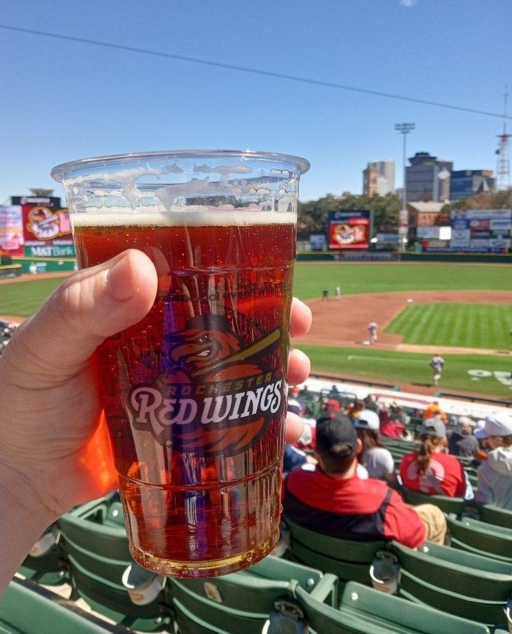 Rochester does it best ⚾️🍺 Red Wing Red Ale, @rocredwings, and a @zweigles red hot.⁠
⁠
#rochesterredwings #redwingredale #explorerochester #rochesterbeer⁠
⁠
📸: Wayne Slingluff⁠