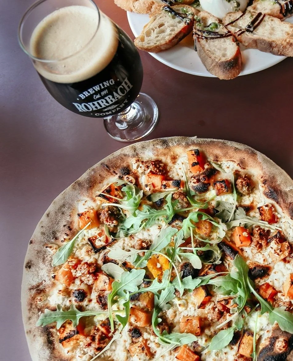 The $20 decision you&rsquo;ll never regret. 🍕 Pints + Pies Wednesdays all night, and Thursday&ndash;Saturday [4pm&ndash;6pm] at the Railroad St. Beer Hall.⁠
⁠
#rohrbachbeer #woodfiredpizza #rocfoodie