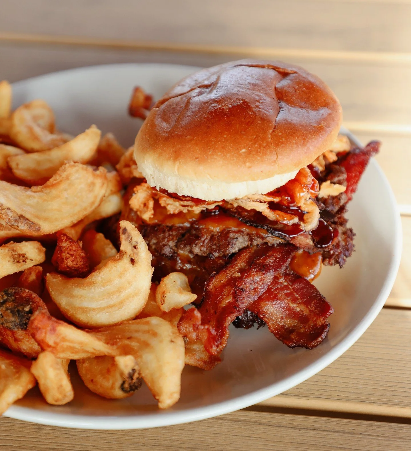 Because we know you already went through all those snow storm groceries🍔 Half-pound smashed burger, cheddar, bacon, funky fried onions, bourbon sauce, brioche bun⁠
⁠
Get cozy at the brewpub!