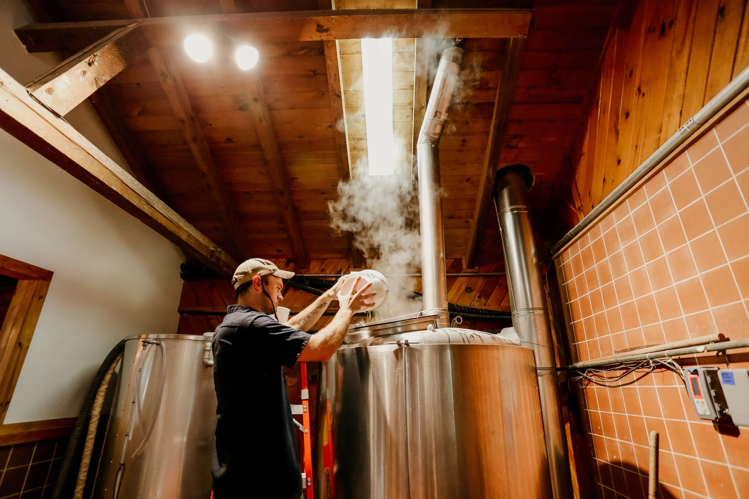 Brewer working in microbrewery at Buffalo Rd.