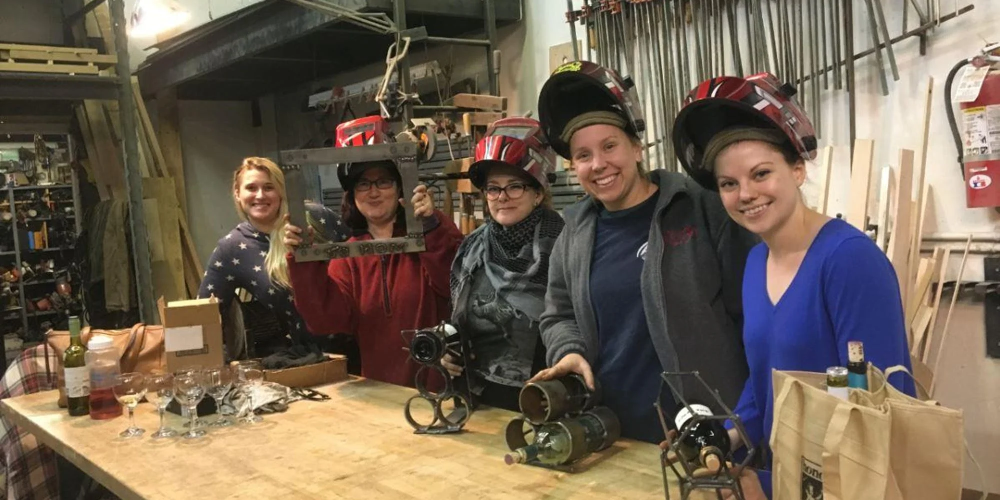 SI MakerSpace - Women Welding Wine.jpg