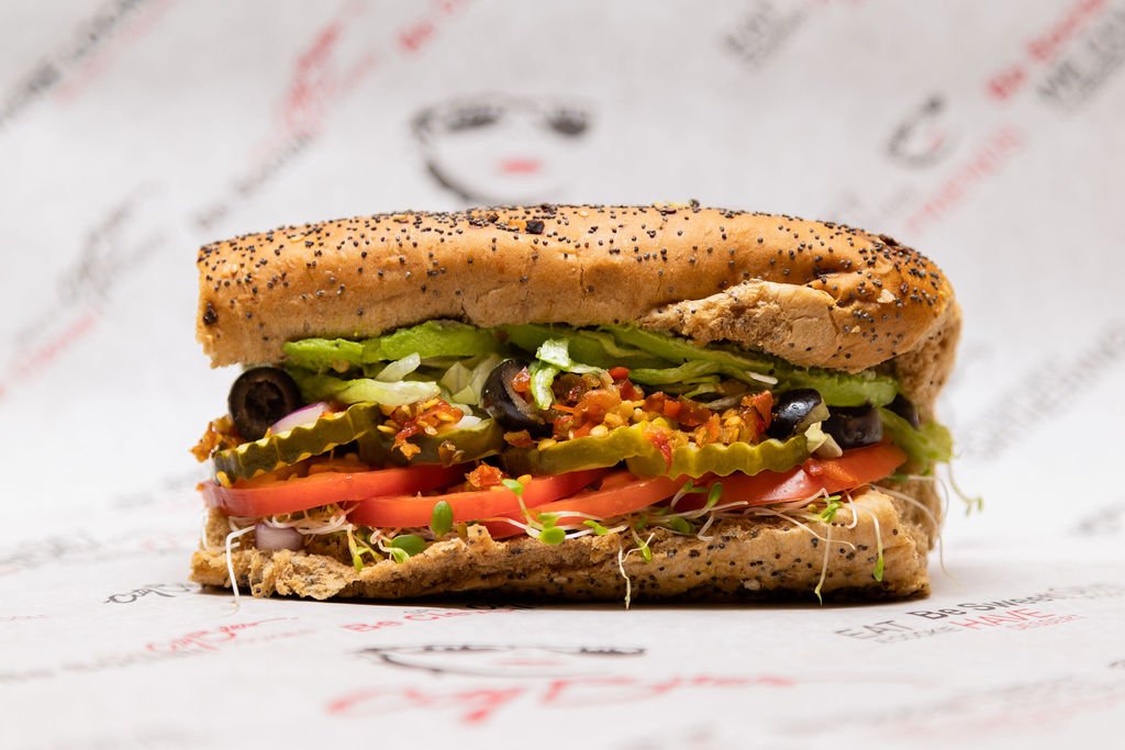   Veggie   Avocado, alfalfa sprouts, lettuce, tomatoes, red onions, pickles, black olives, crushed cherry peppers, blended oils, City Bites' ranch dressing, salt &amp; pepper. 