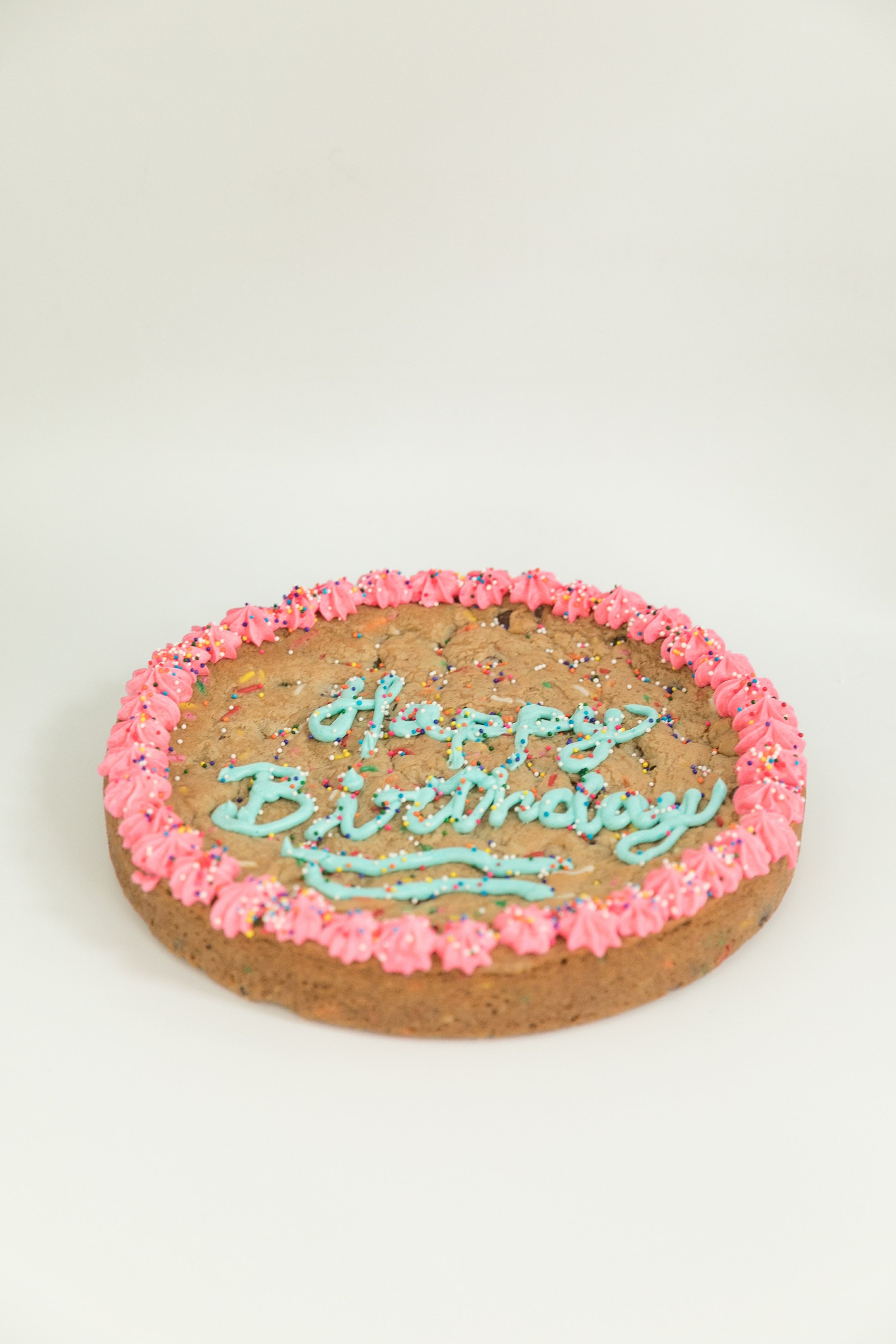  Happy Birthday chocolate chip cookie cake with lots of sprinkles and vanilla buttercream frosting 