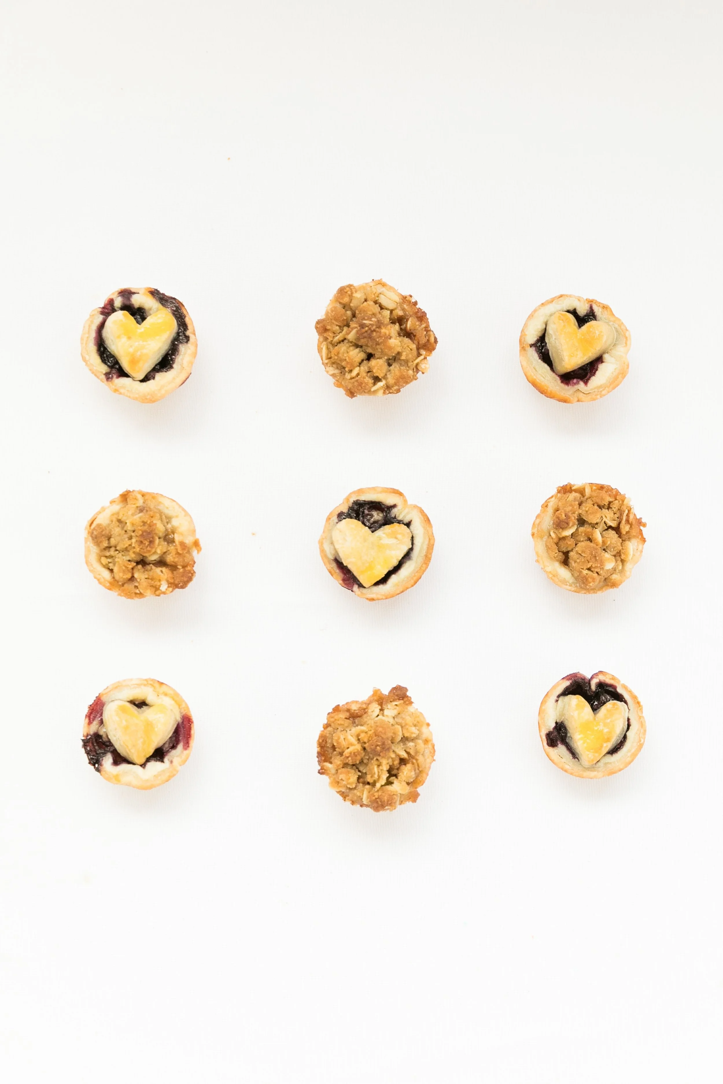 Blueberry and dutch apple mini pies are perfect for a dessert table setup