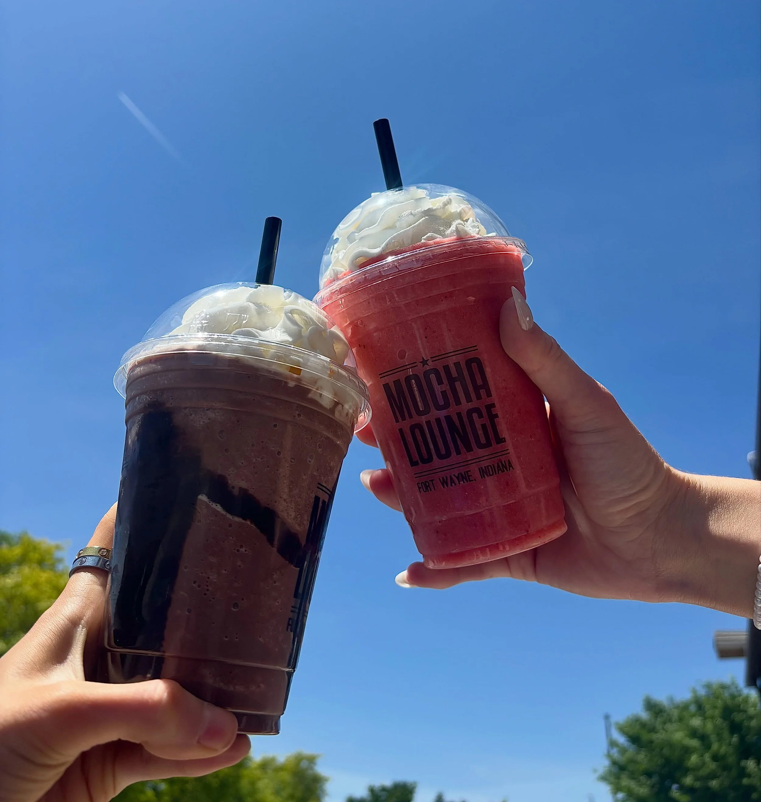 this is what we mean when we say summer in a cup. strawberry banana smoothie for the days you want something fresh and easy, strawberry mocha frappe for when you still want your coffee but also want it fun 🍓🍌🍫