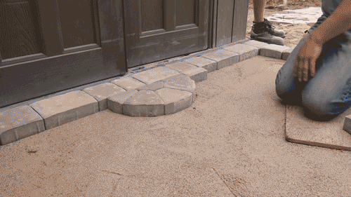 Just lay the pavers gently without twisting or pushing into the sand