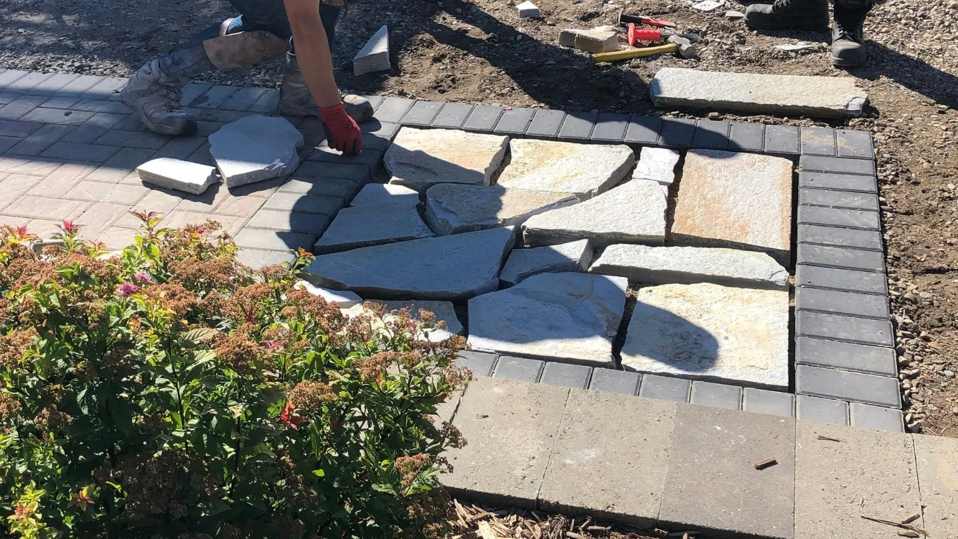 Jerry shows how to build stone patios and walkways at a Hilgersom Landscape Centre workshop.