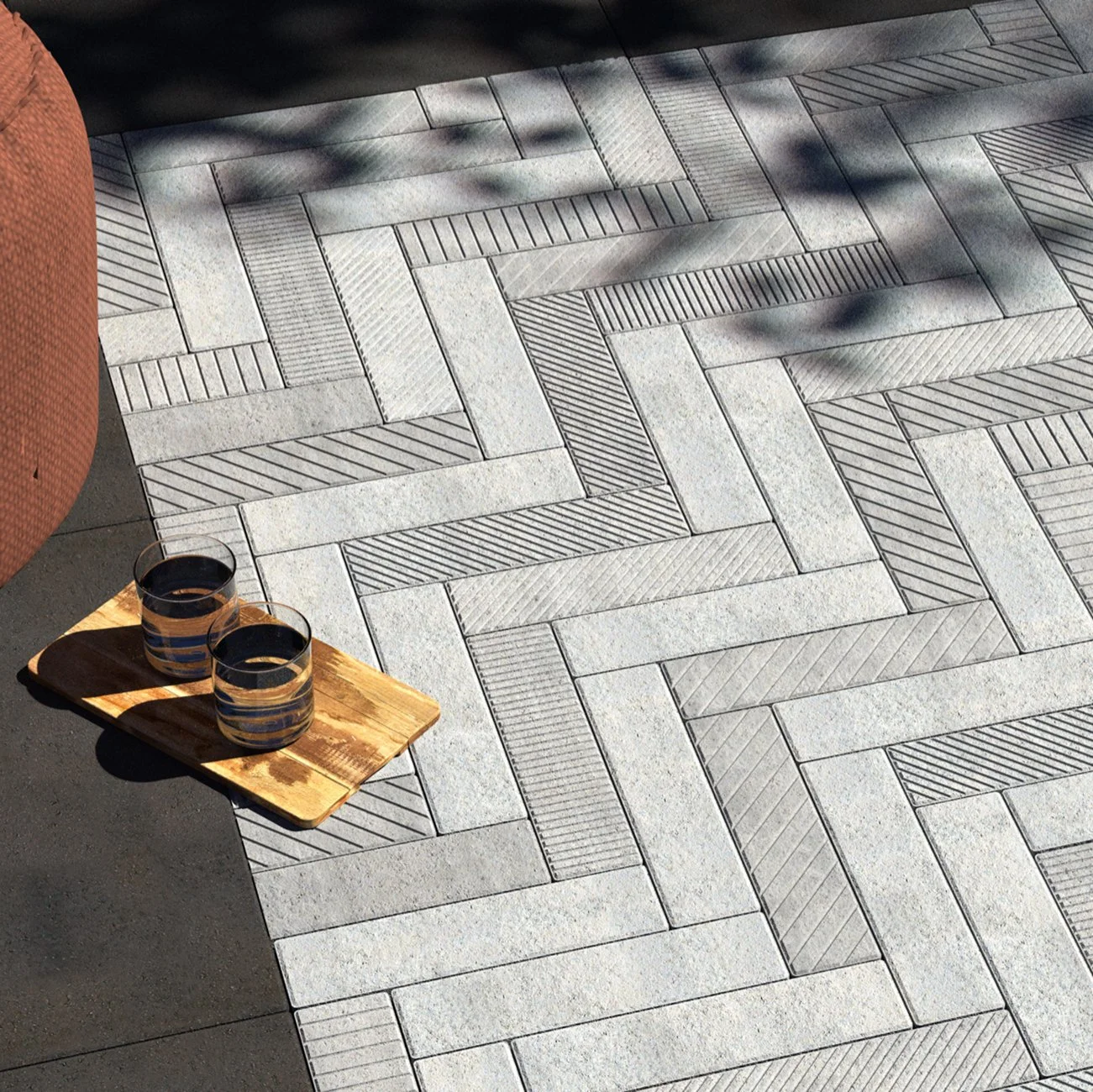 Pavers of different textures make a beautiful patterned patio.