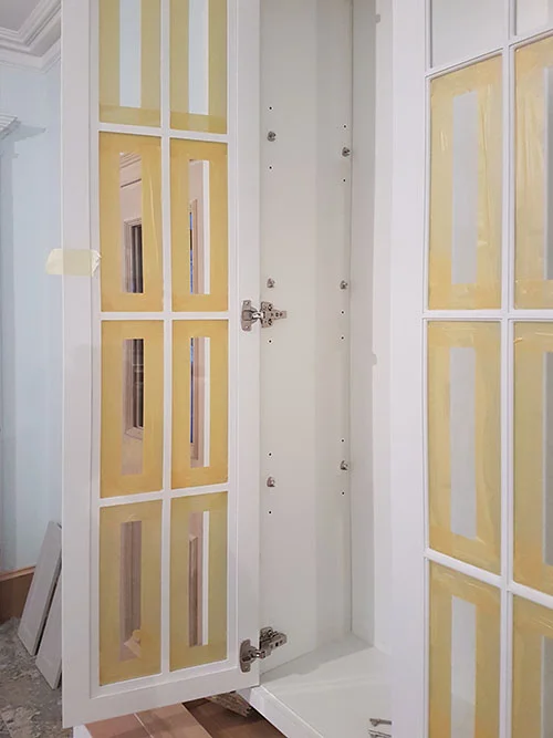 Taking care while hand painting a kitchen