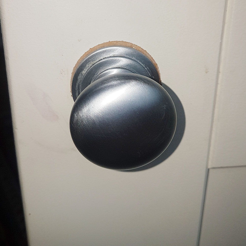 You can see the knob wasn't removed before painting