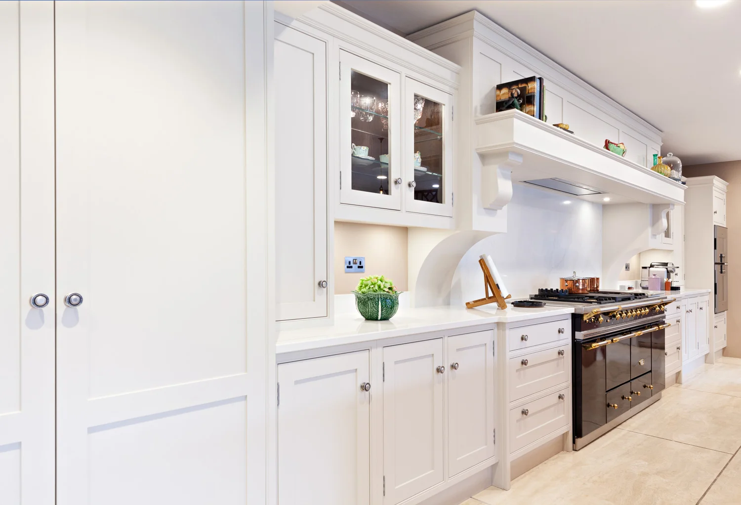 The back wall and main units of the central kitchen display at Nicholas Moody Kitchens