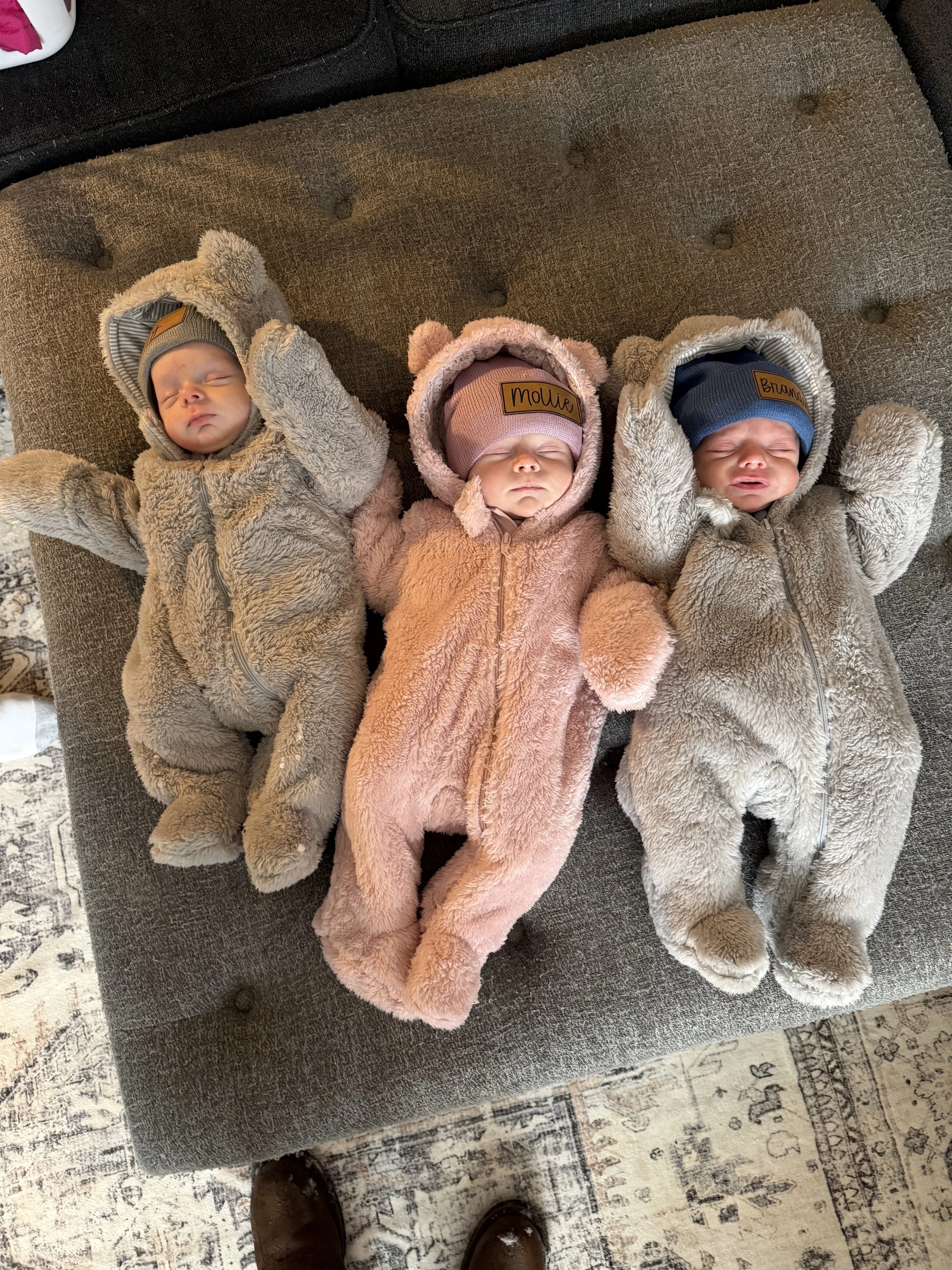 Dusty Porter's newborn triplets in bear onesies