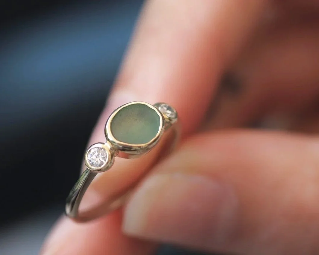 Thea Dinas Sea glass ring in a hand