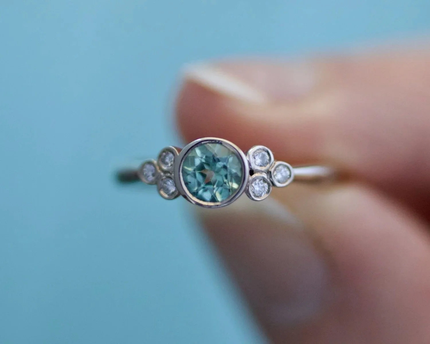 Godreva+Ethical+teal+sapphire+engagement+ring+.jpg