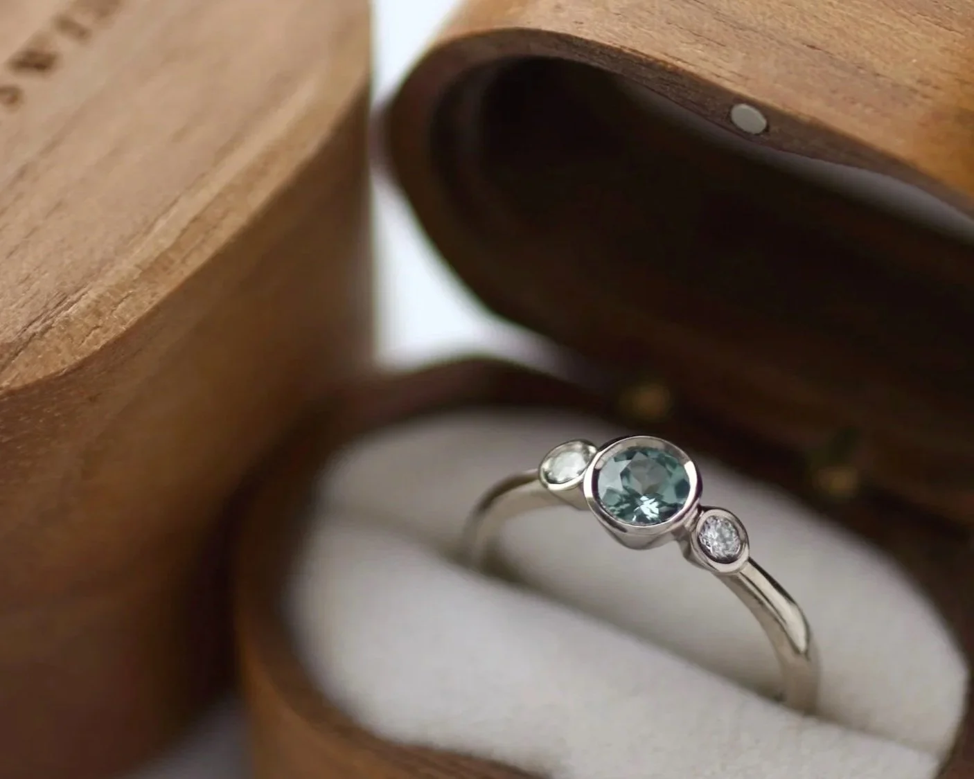 18ct%2Bwhite%2Bgold%2Bethical%2Bteal%2Bsapphire%2Bengagement%2Bring.jpg