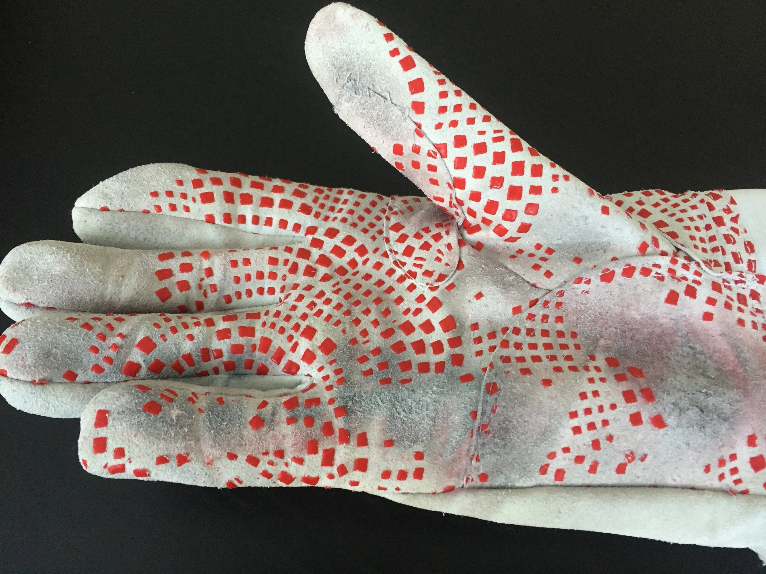 Fencing glove mended with dental floss