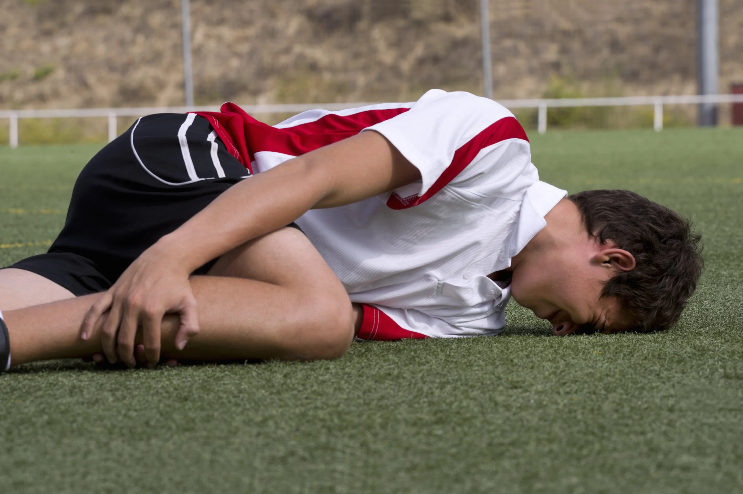An athlete with painful cramps