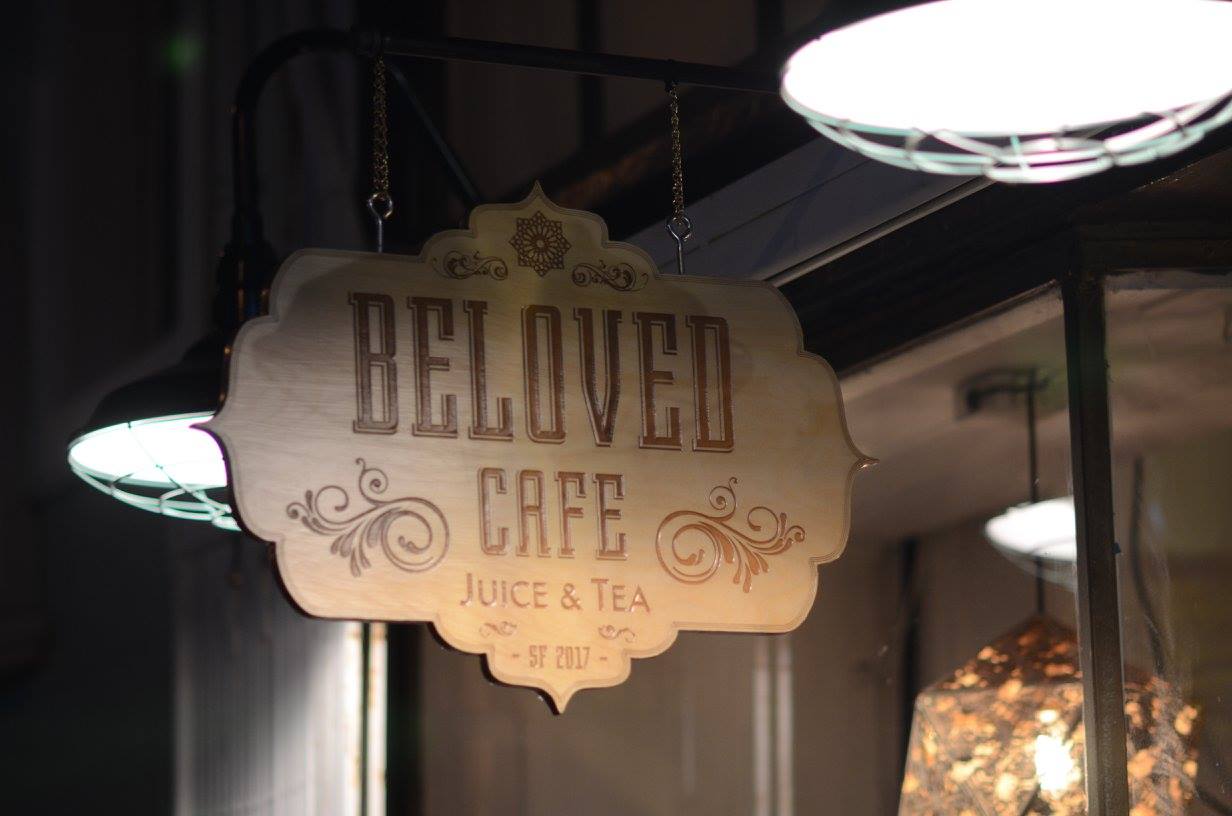 beloved cafe hanging sign.jpeg