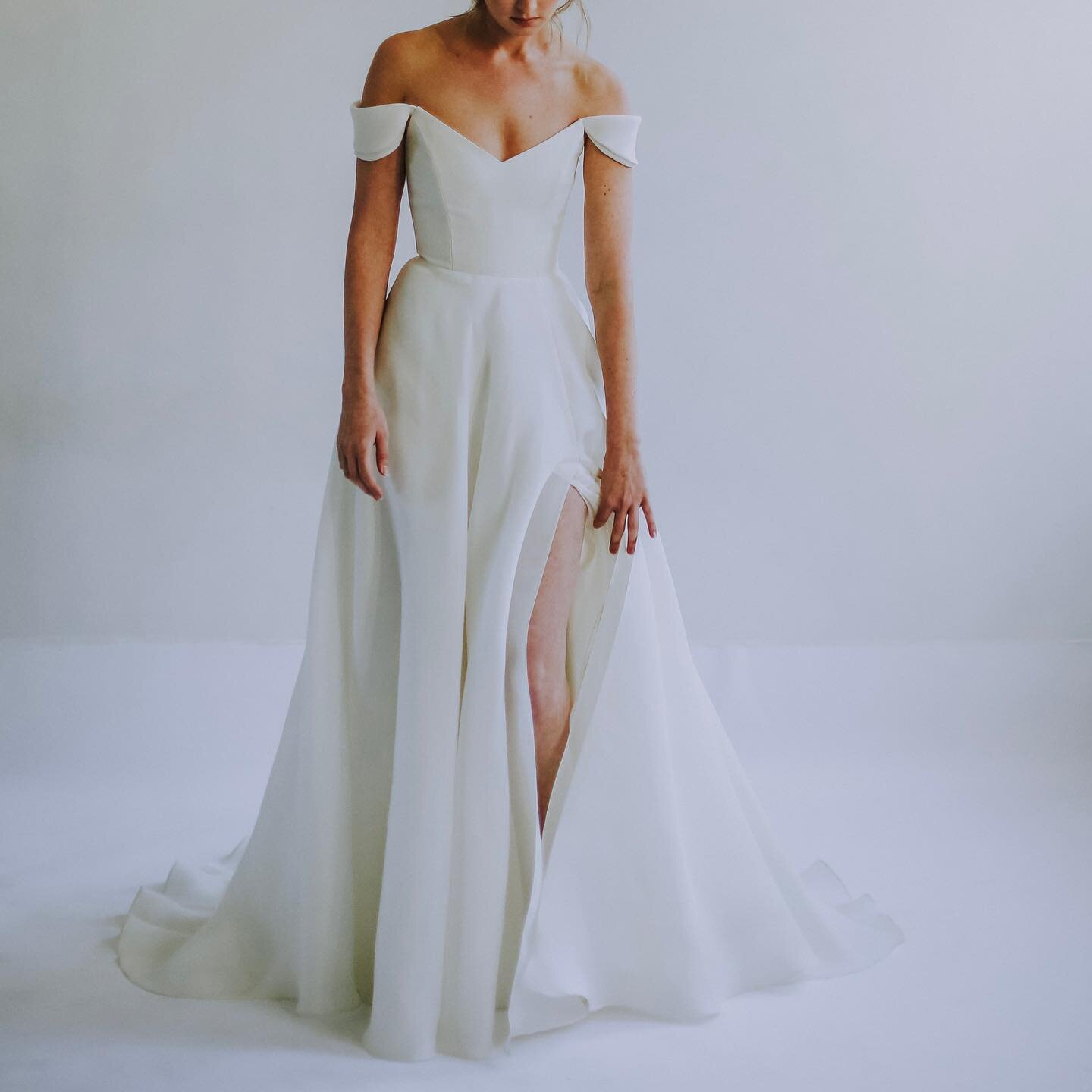 baby, you're so classic ✨ meet Eliza, the newest arrival from @leannemarshallofficial 🤍 this silk gazaar gown has a supportive structured bodice with petaled off-the-shoulder sleeves for an effortless + timeless look 🌹