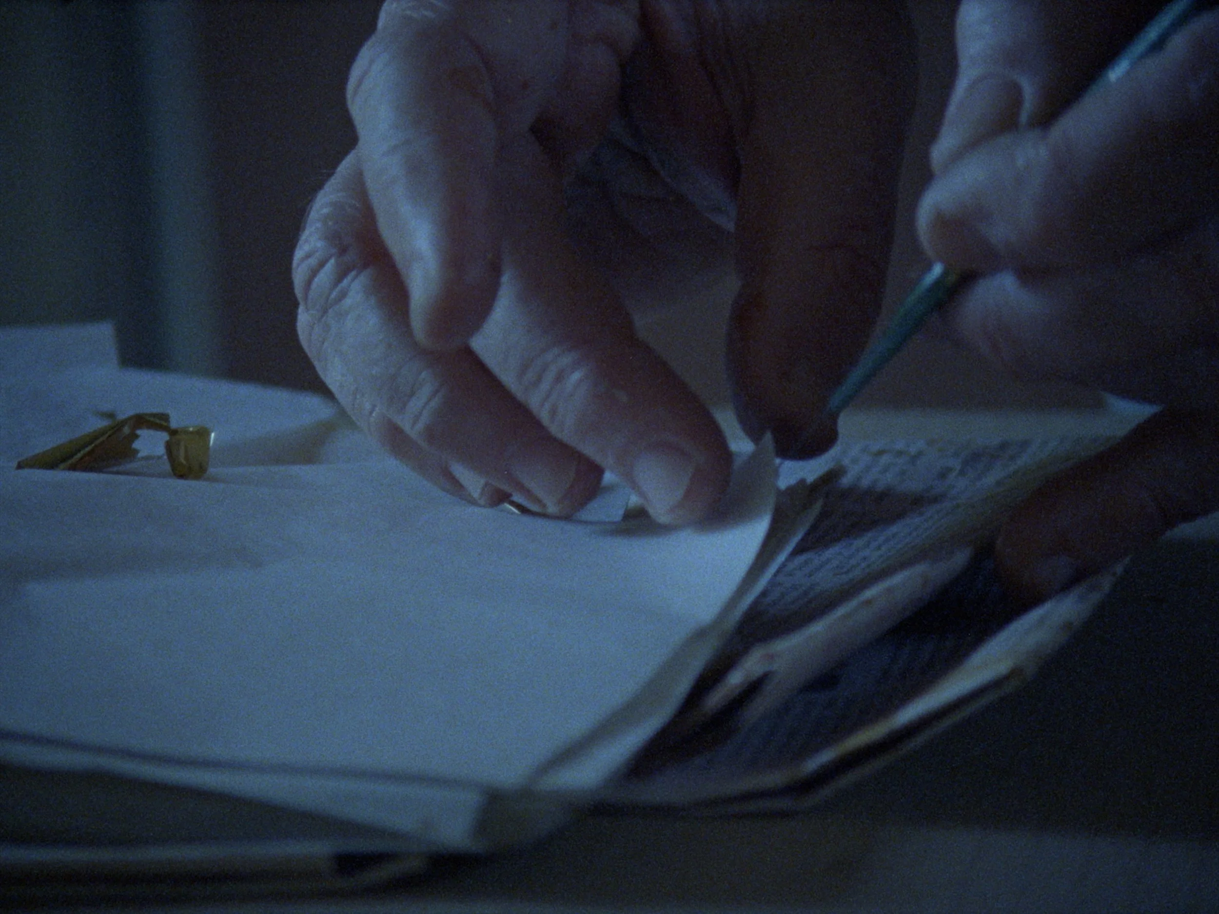 Close-up of Lachlan Warner’s hands during artistic process, intimate documentary cinematography by Elliott Deem