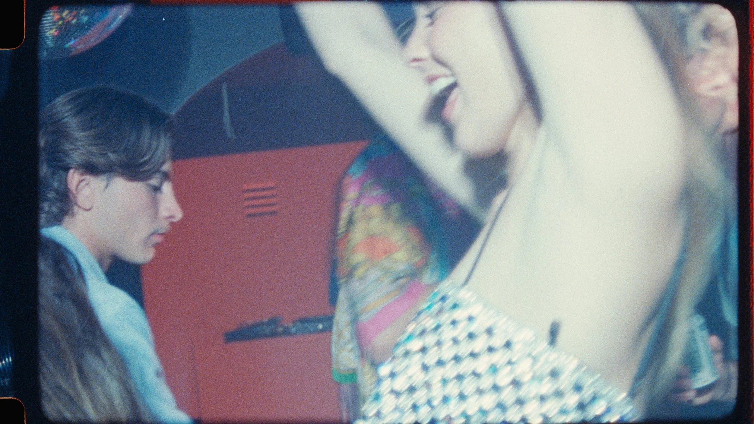 Stylised flash-lit moment in tequila brand campaign, experimental commercial cinematography by Elliott Deem