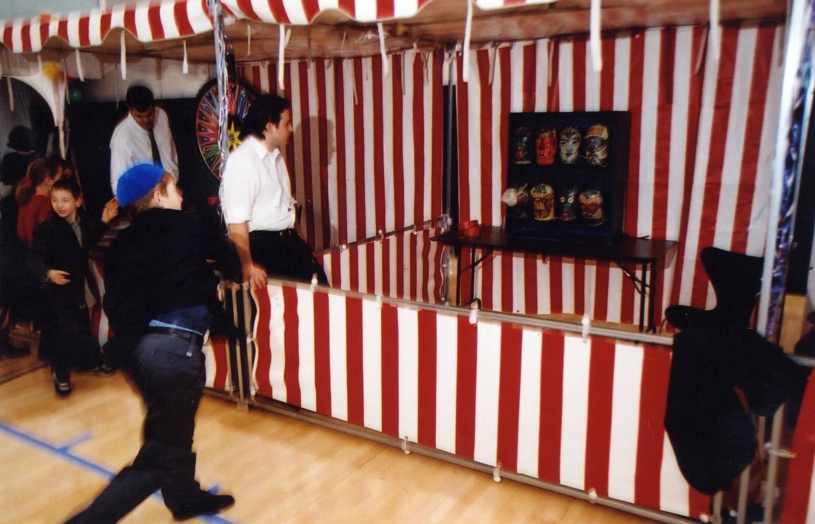 Boy throwing ball at Carnival.jpg