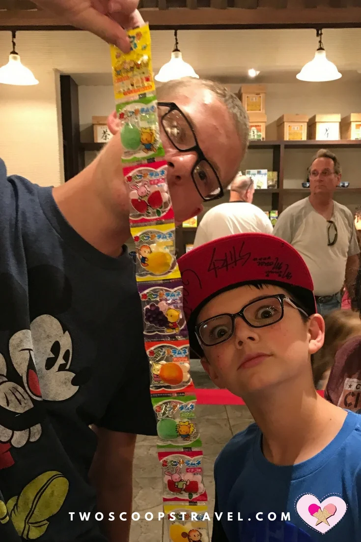 Teens enjoying Epcot candy challenge in Japan