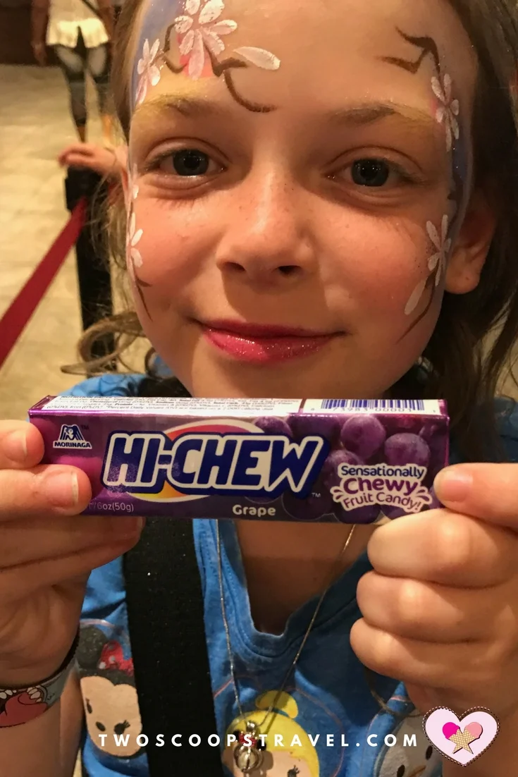Two Scoops Travel Teen enjoying Hi-Chew candy in Japan at Epcot
