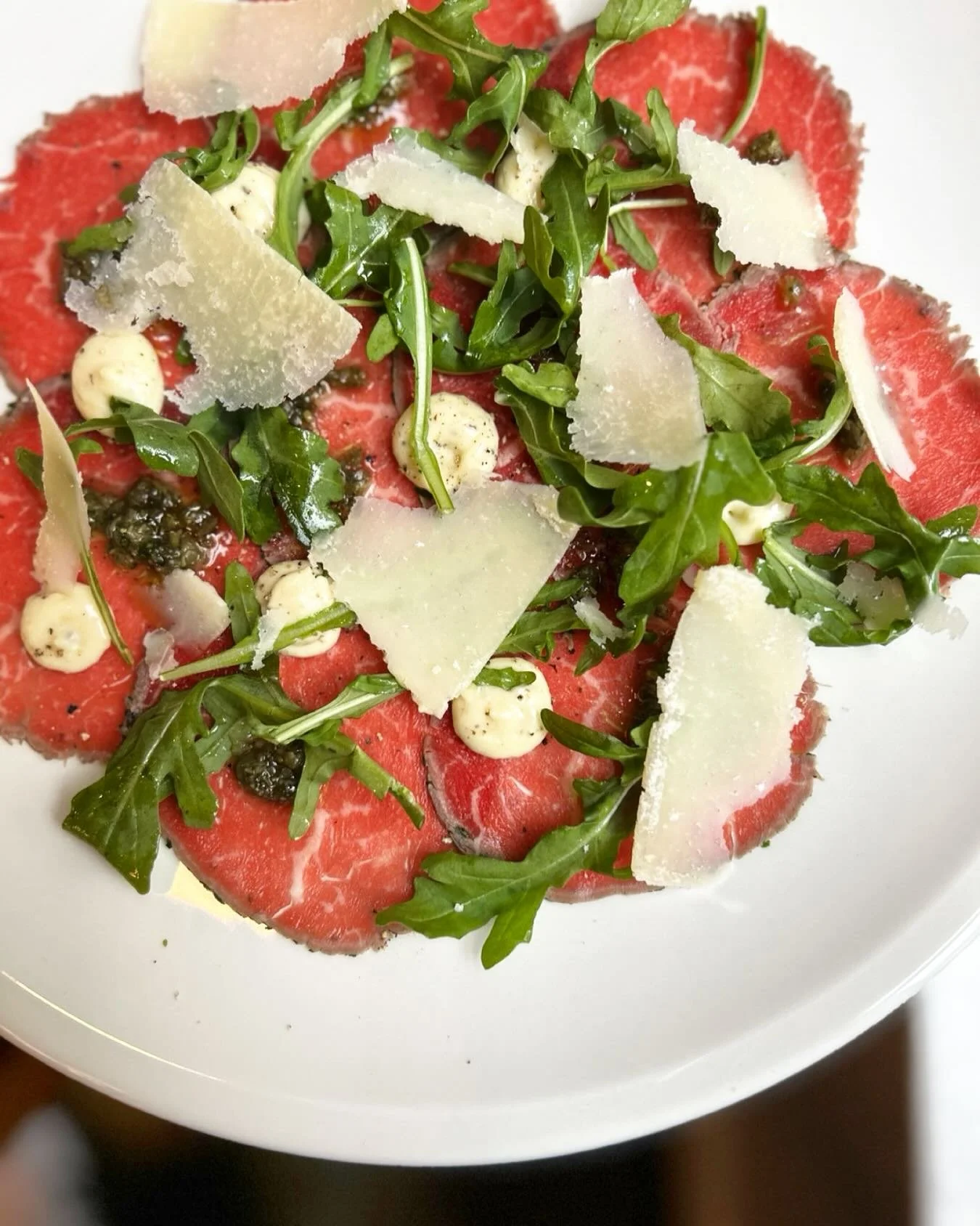 Carpaccio back on the the menu this weekend!  Caper relish, black truffle aioli, arugula, and parm served with our house made focaccia!