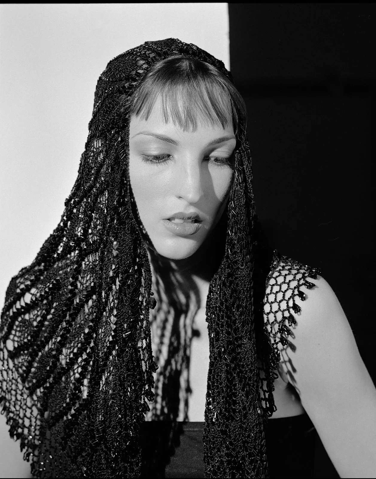 Woman in a Crocheted Headscarf