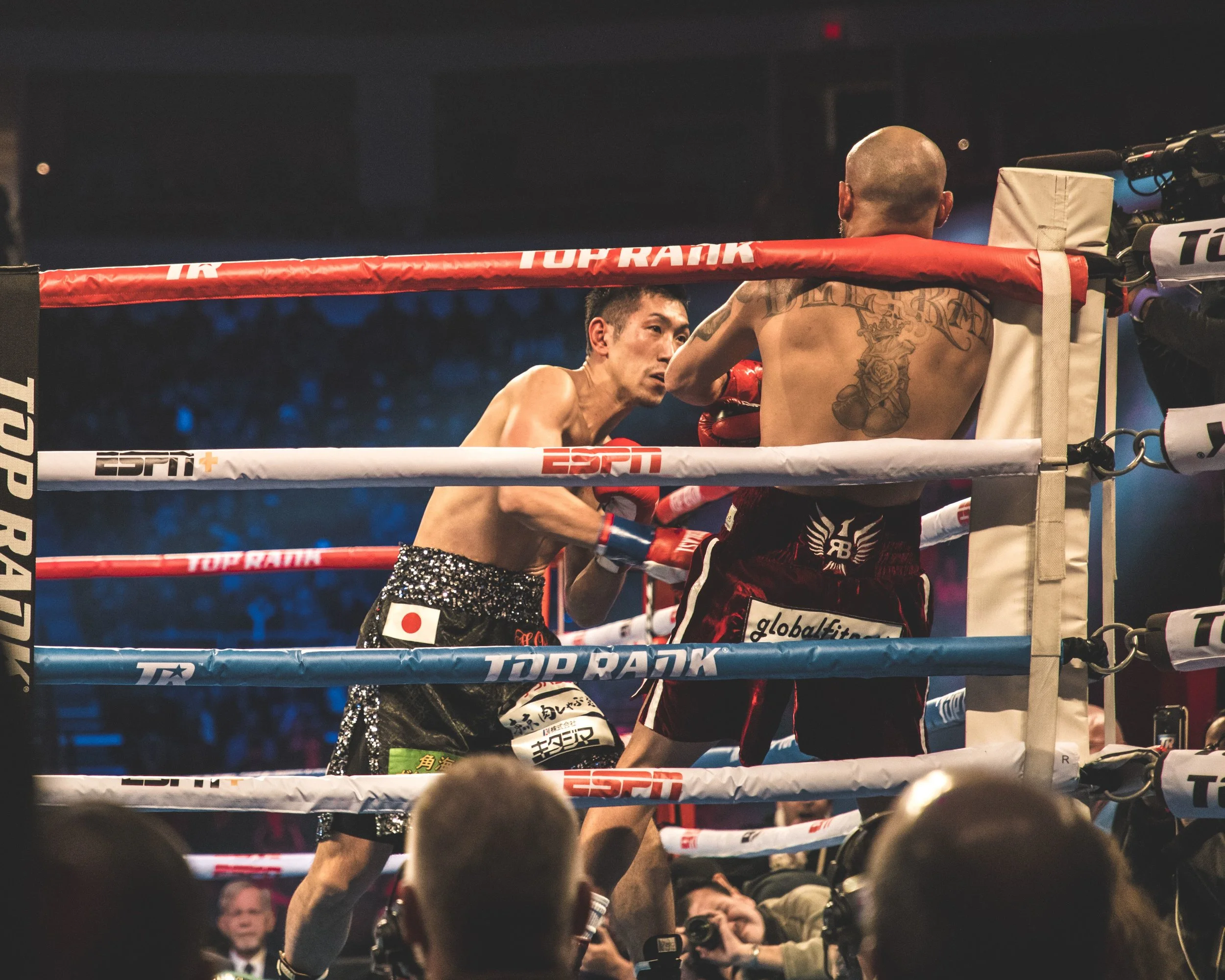 Hiroki Okada pins Ray Beltran against the ropes by Benny Blanco