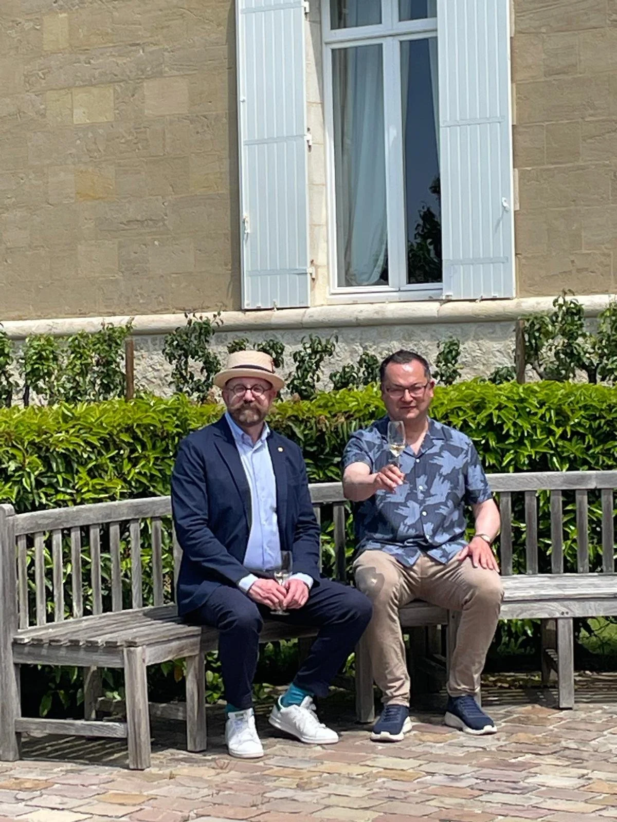 5.2.14 Friday 22 May 2026 Ch Haut Bailly - champagne on the benches.jpg