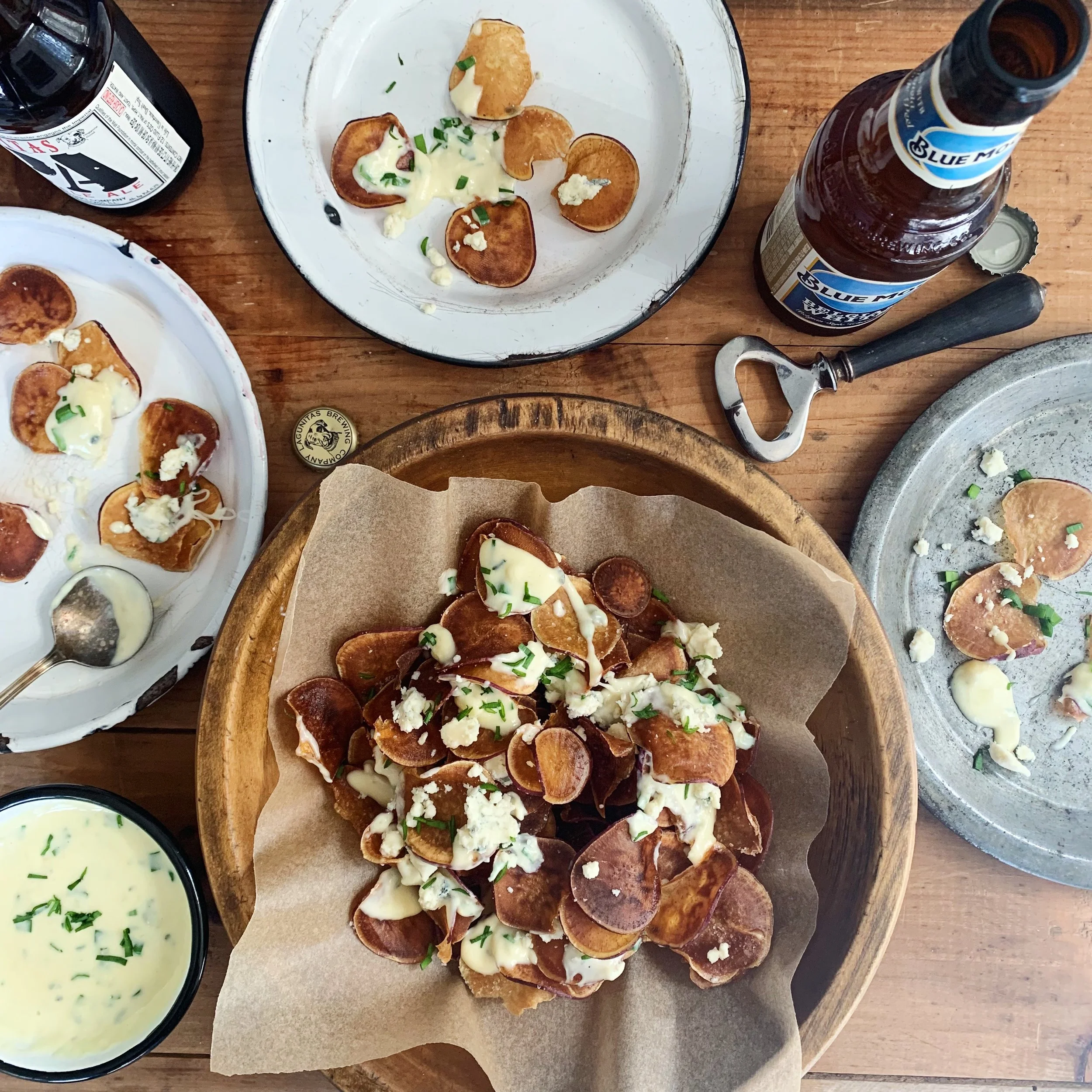 BLUE CHEESE SWEET POTATO CHIPS 1. Cheese sauce: in a small saucepan bring 1 ½ C heavy cream to a gentle boil (keep an eye on this so it doesn’t boil over). Reduce heat and simmer until reduced by half, stirring often, 30 min 2. When reduced, add 3 o…