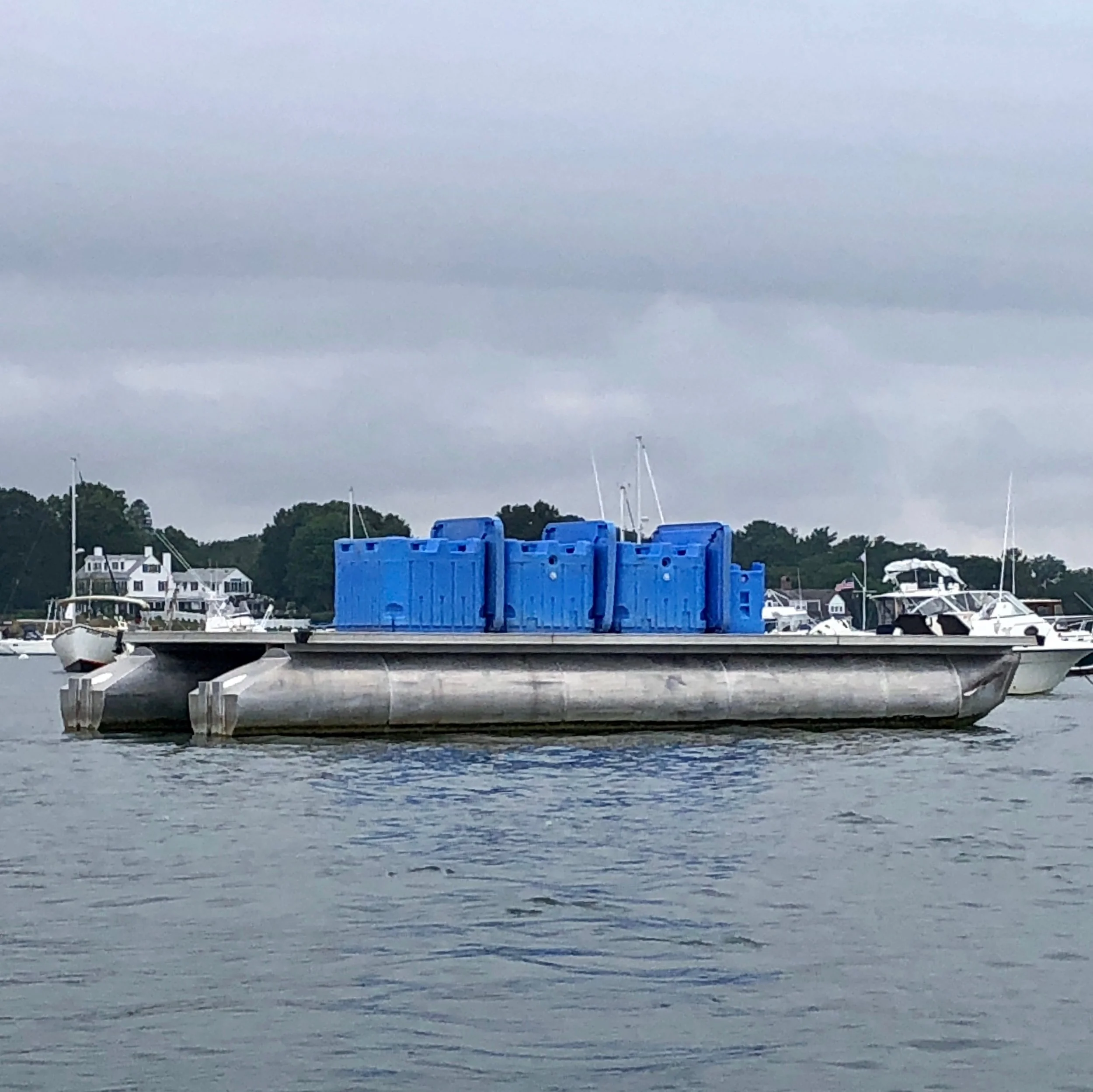 The barge, which which transports bagged oysters to the refrigerator truck.