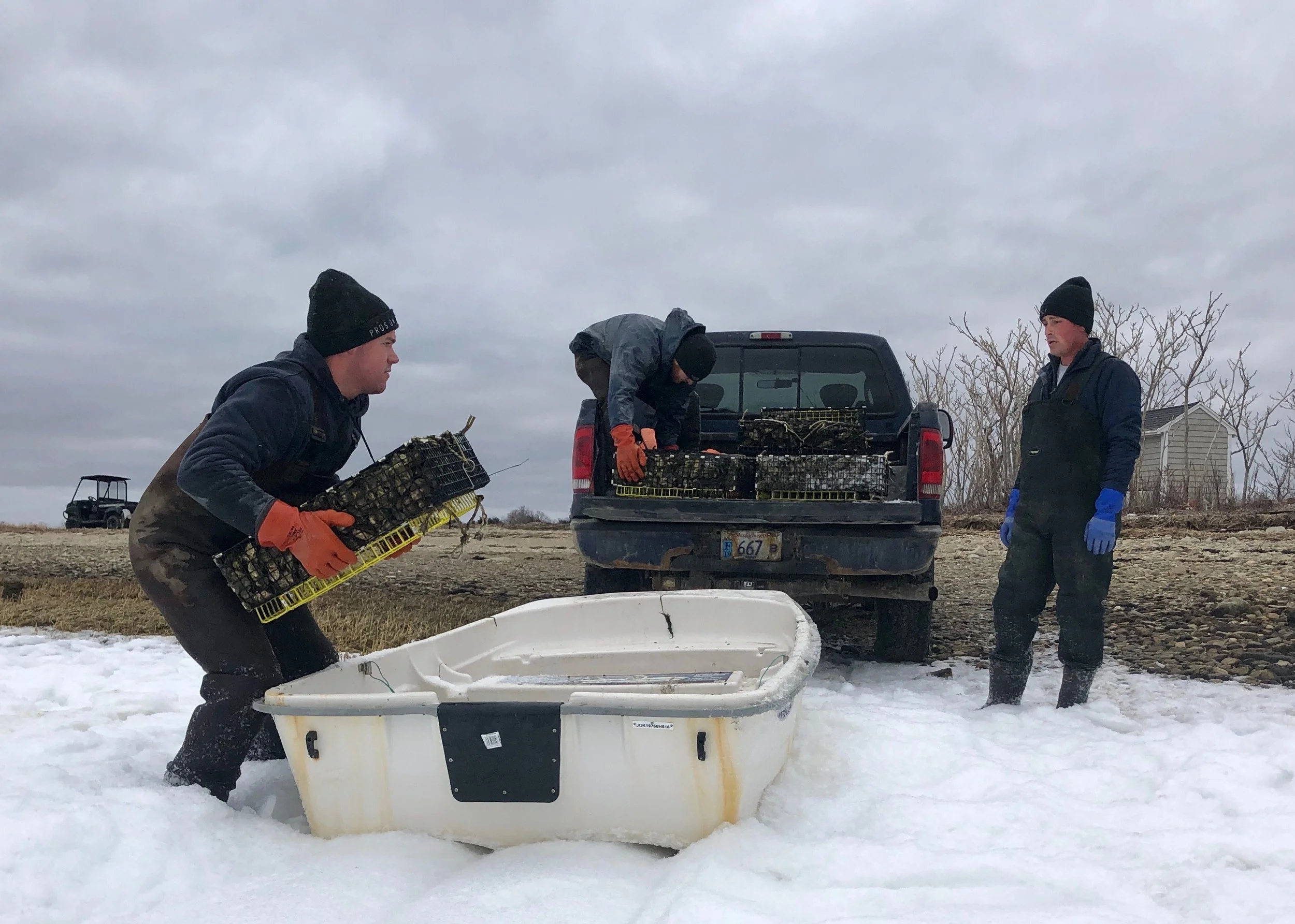 The tray Tim is lifting is called a “holding car”. When full of oysters it weighs about 80 pounds.