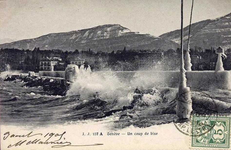 Vintage postcard of Geneva, Un coup de Bise, with an icy view of Lac Léman and the Salève.