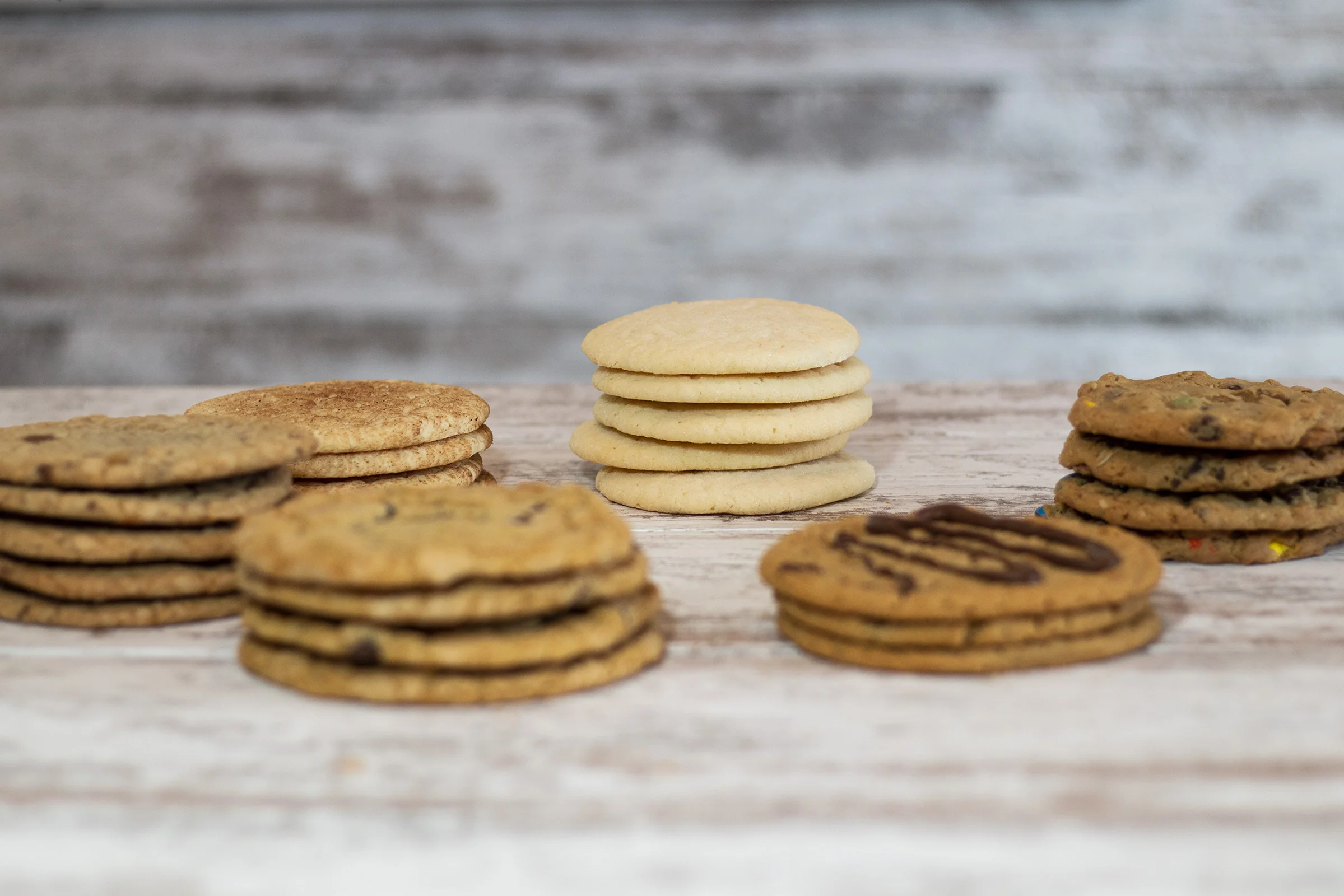  This shoot was done for a local cookie shop “Baked by Bobbi.”    I styled the shoot, took the photographs, and edited them. 
