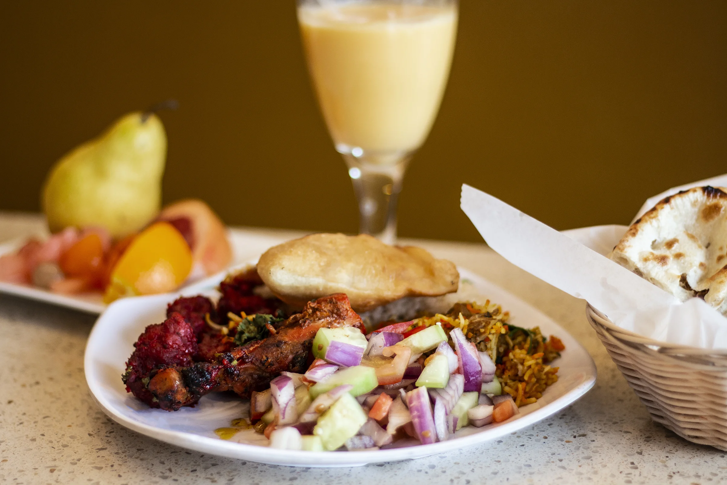  This photograph of buffet serving was taken for the Indian restaurant ”Spice and Rice.” This photography was used for their new website.    I styled the shoot, took the photographs, and edited them. 