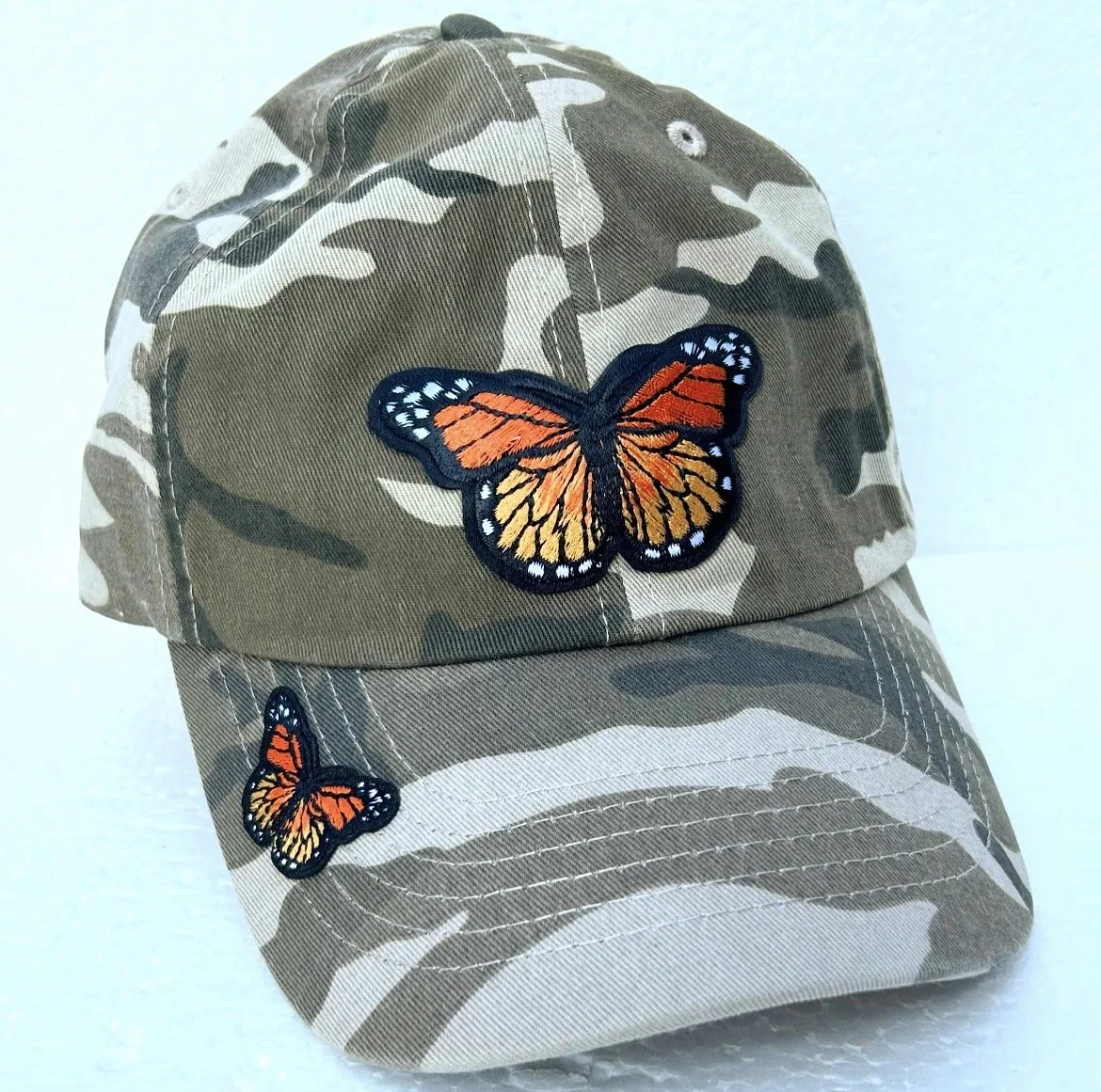 camo cap w/monarch butterfly patches