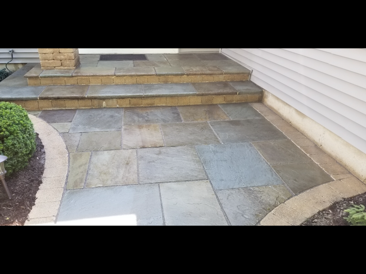 After: stripped off bad sealer, brought the life back to this front entrance.
