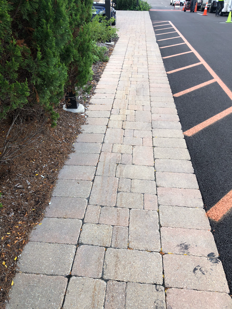 Before: snow plow rust marks and tar stains Chicago Bears Halas Hall