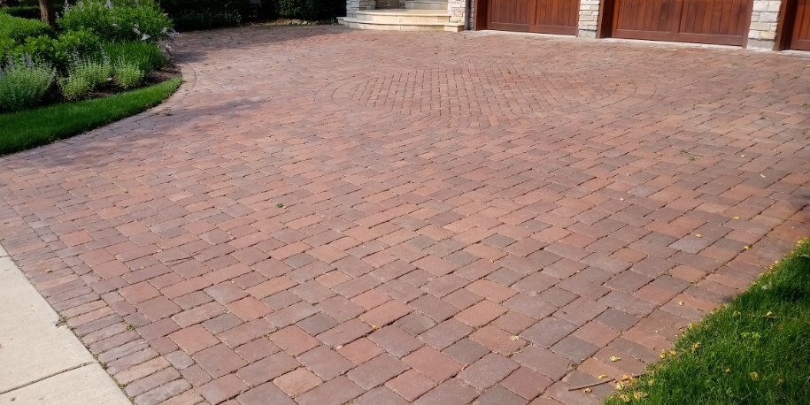 Before: clay brick driveway