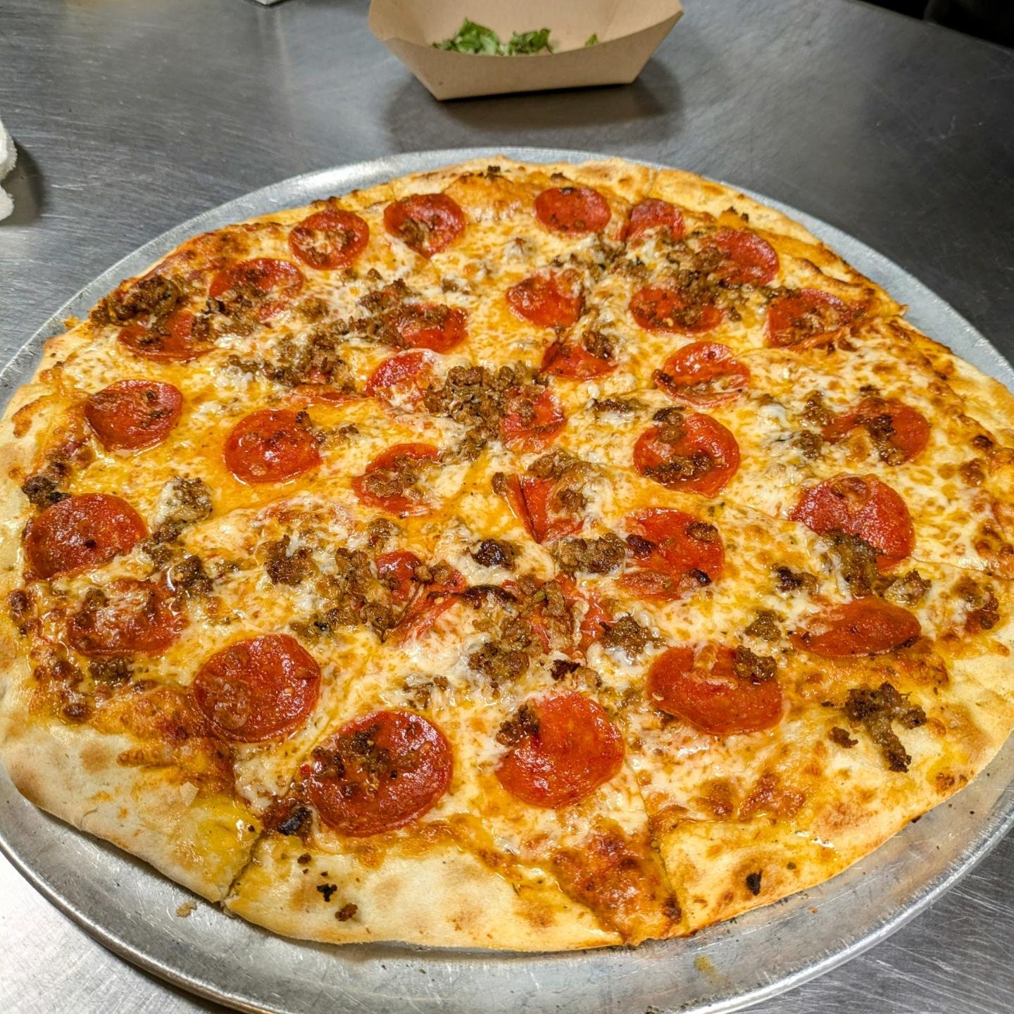 Game night special, to go or dine in: 16&quot; two topping pizza and 12 wings for $30.99. We've got the games on inside and out, come see us!